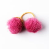 all-about-eva-elastiek-pluizig-bolletje-donker-roze