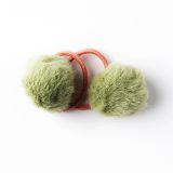 all-about-eva-elastiekje-pluizig-bolletje-groen