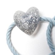 Glitter elastiekje hartje zacht paars