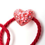 Elastiekje glitter hartje donkerroze