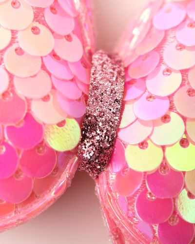 Elastiekje vlinder pailletten roze