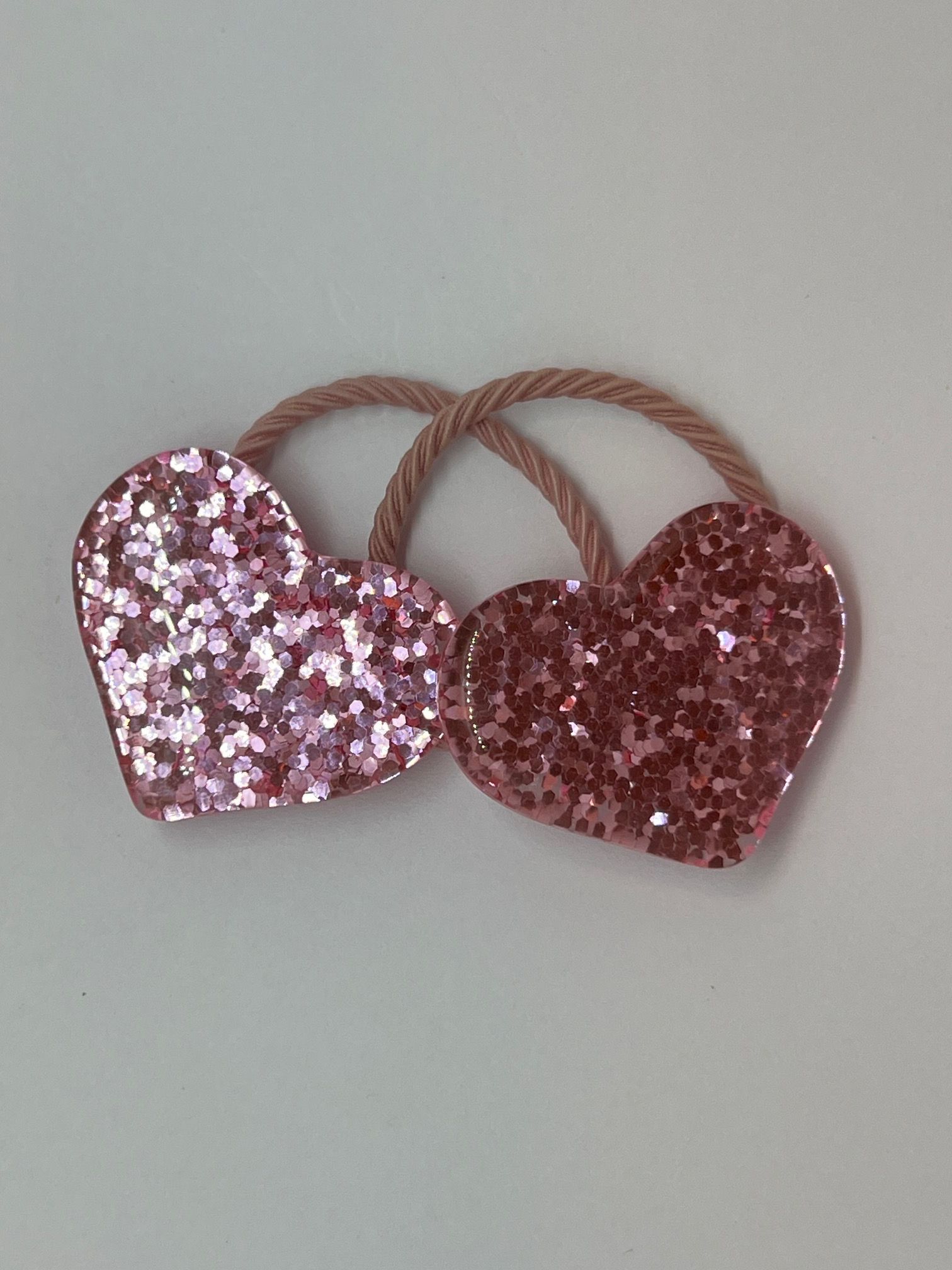Glitter elastiekje hart XL roze