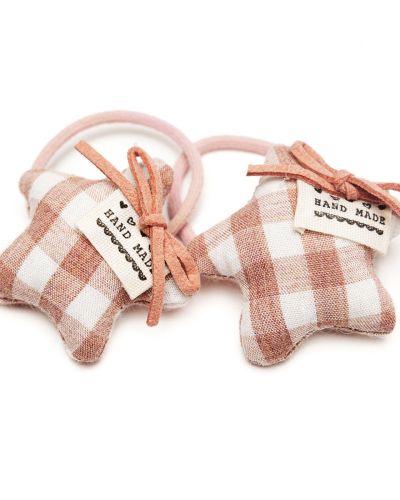 Elastiekje ster kussentje bruin