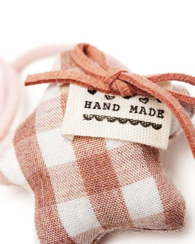 Elastiekje ster kussentje bruin