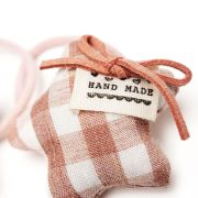 Elastiekje ster kussentje bruin