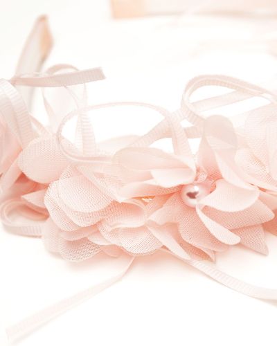 Diadeem roze linten en bloemen